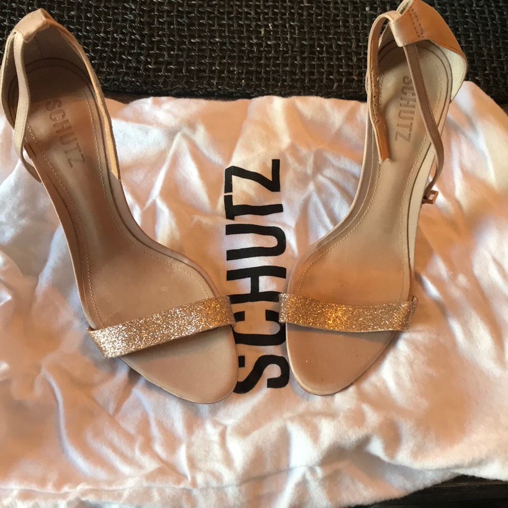 Rose gold Schutz pumps. Never worn. Size 8.5